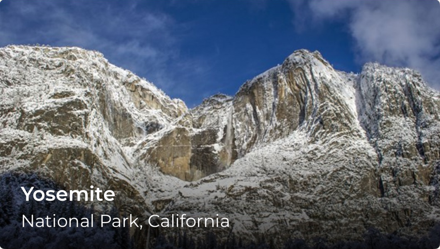 Snowy mountains, in the lower left corner a word reads Yosemite.