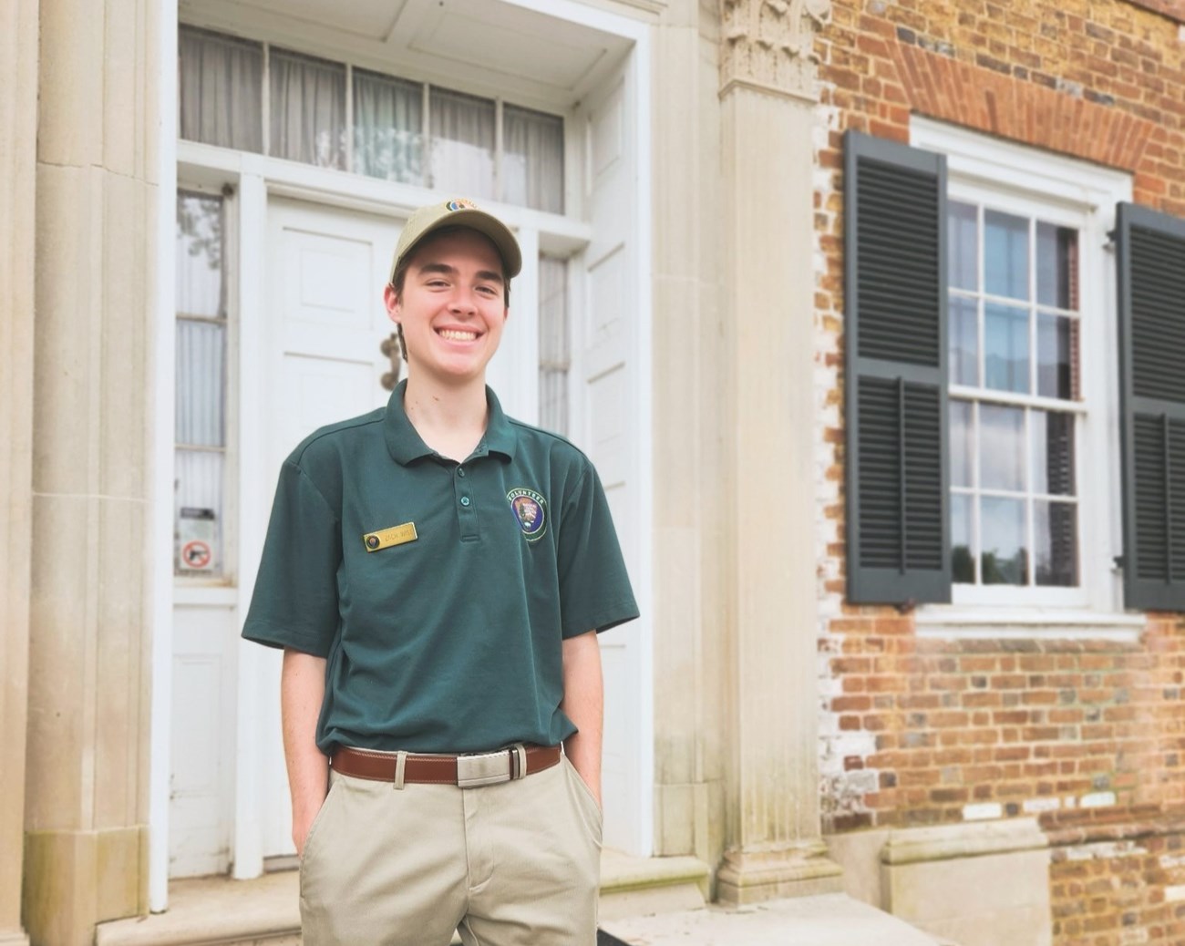 Summer 2025 inter Zach Wise Fredericksburg and Spotsylvania National Military Park summer intern Zach Wise, standing in front of the river side main door to Chatham Manor.