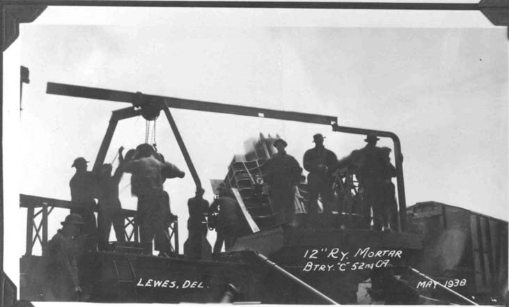a group of soldiers stand atop a historic battery