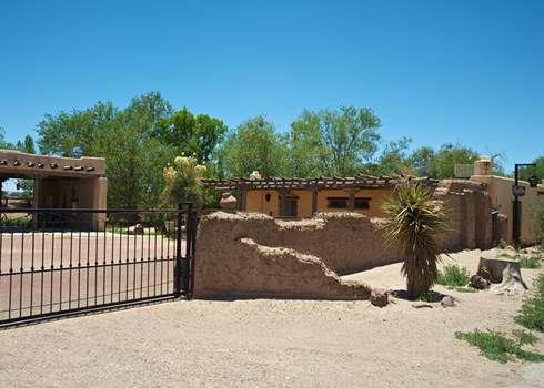 The Butterfield Overland Mail Line made regular rest stops at this building, now a  private residence, southeast of the presidio, where a front gate remains wide enough for a wagon to move through. Photo © Jack Parsons