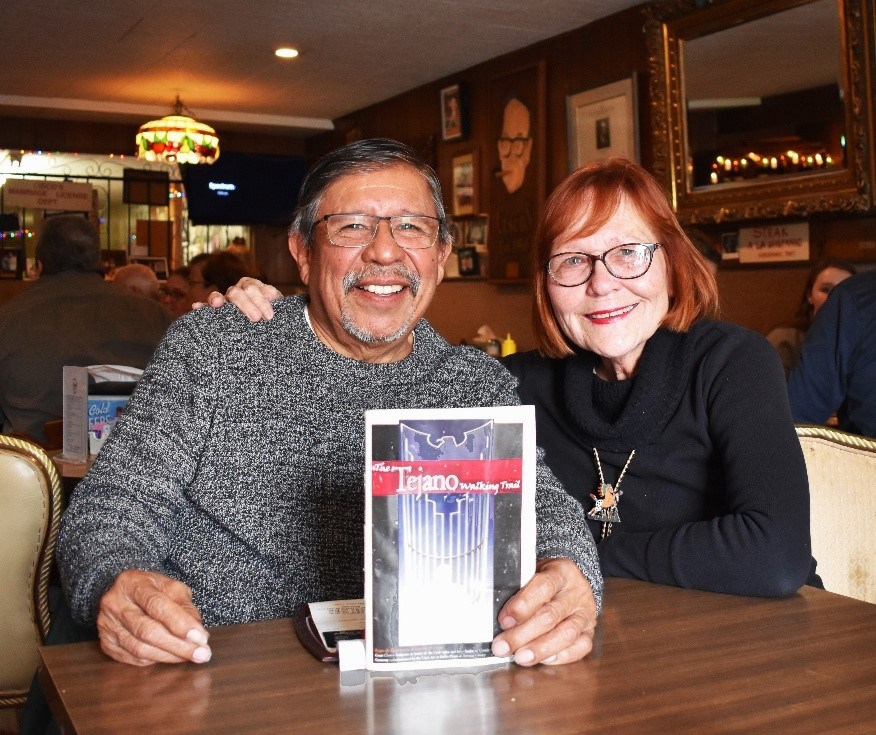 Sabino Renteria, a member of the Austin City Council, and Lori Renteria, the Tejano Trails coordinator for the East Cesar Chavez Neighborhood Planning Team, showcase the original copy of the Tejano Trails brochure. National Park Service photo.