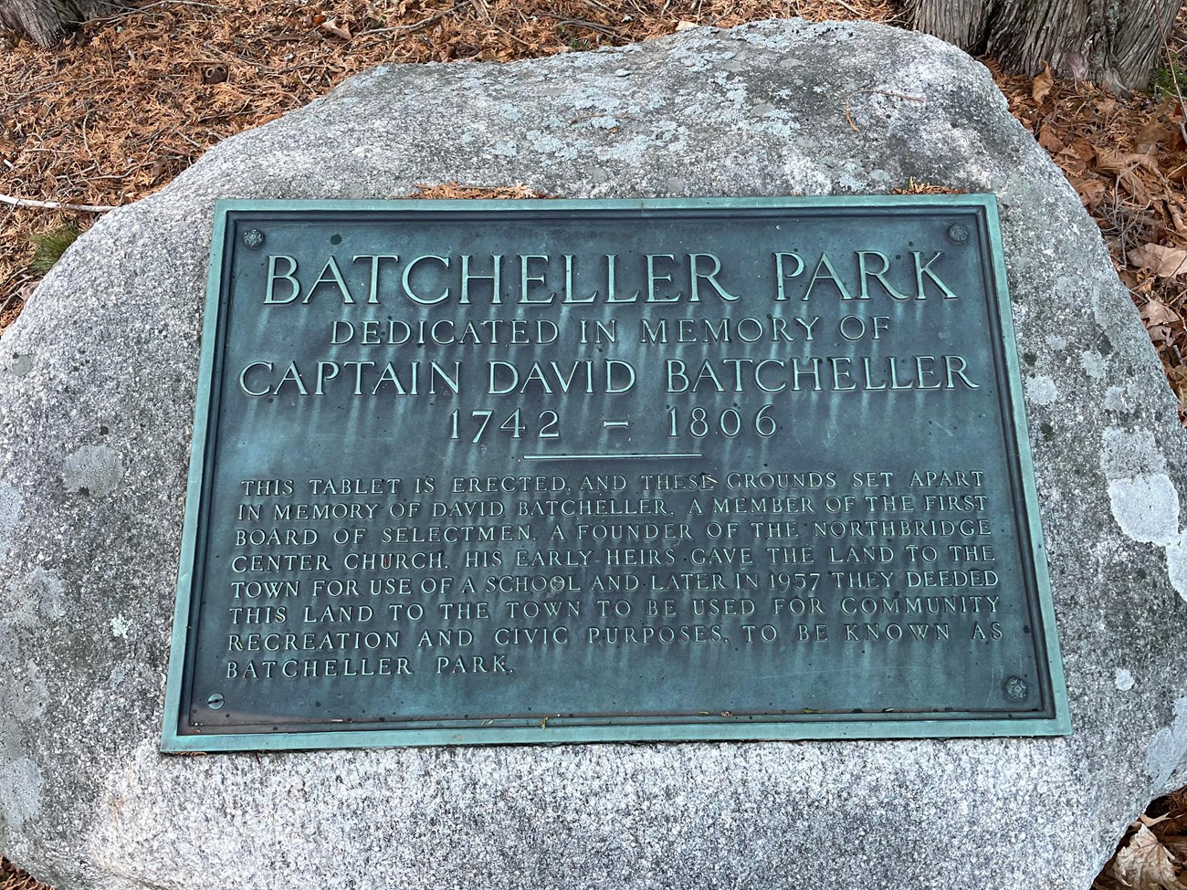 A photo of a stone dedicating a park to Captain David Batcheller