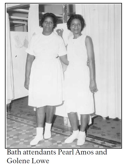 Two African American women standing next to each other