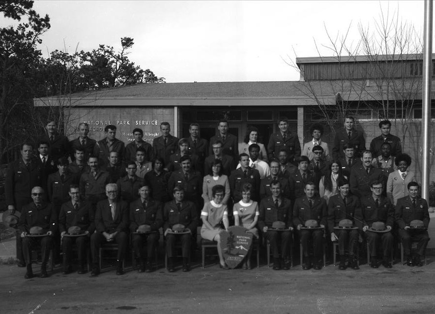 NPS Park Operations class, 1972 NPS employees in uniform stand outside posing for a class photo.
