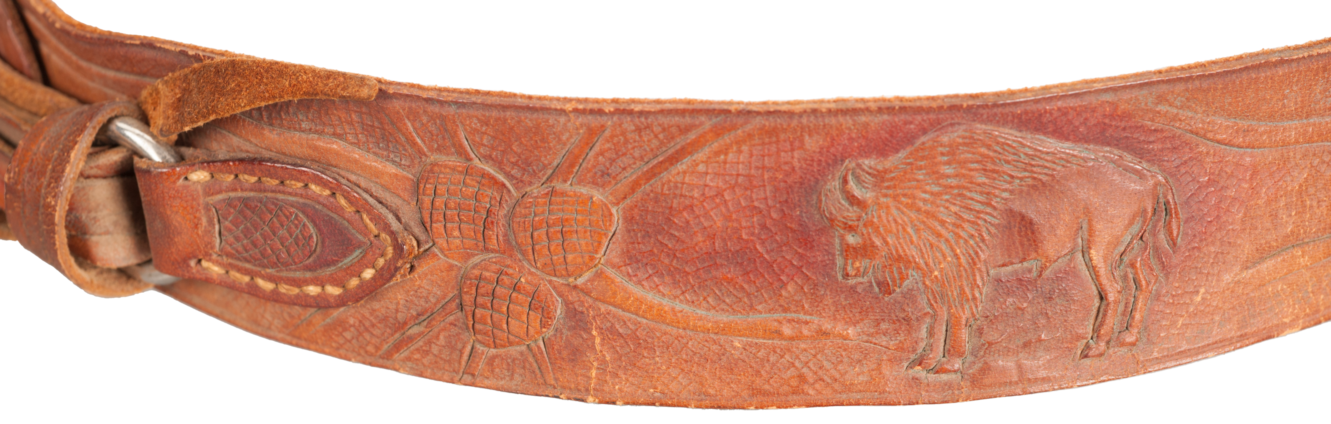 Bison detail on Albright's hatband. Bison figured carved into a leather hatband