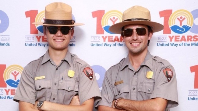 two men in park ranger uniforms