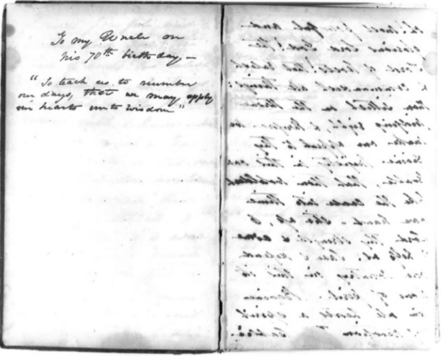 Black-and-white image of a handwritten note. The left page reads: “To my Uncle on his 70th birthday — ‘So teach us to number our days, that we may apply our hearts unto wisdom.’” The right page contains faded cursive writing.