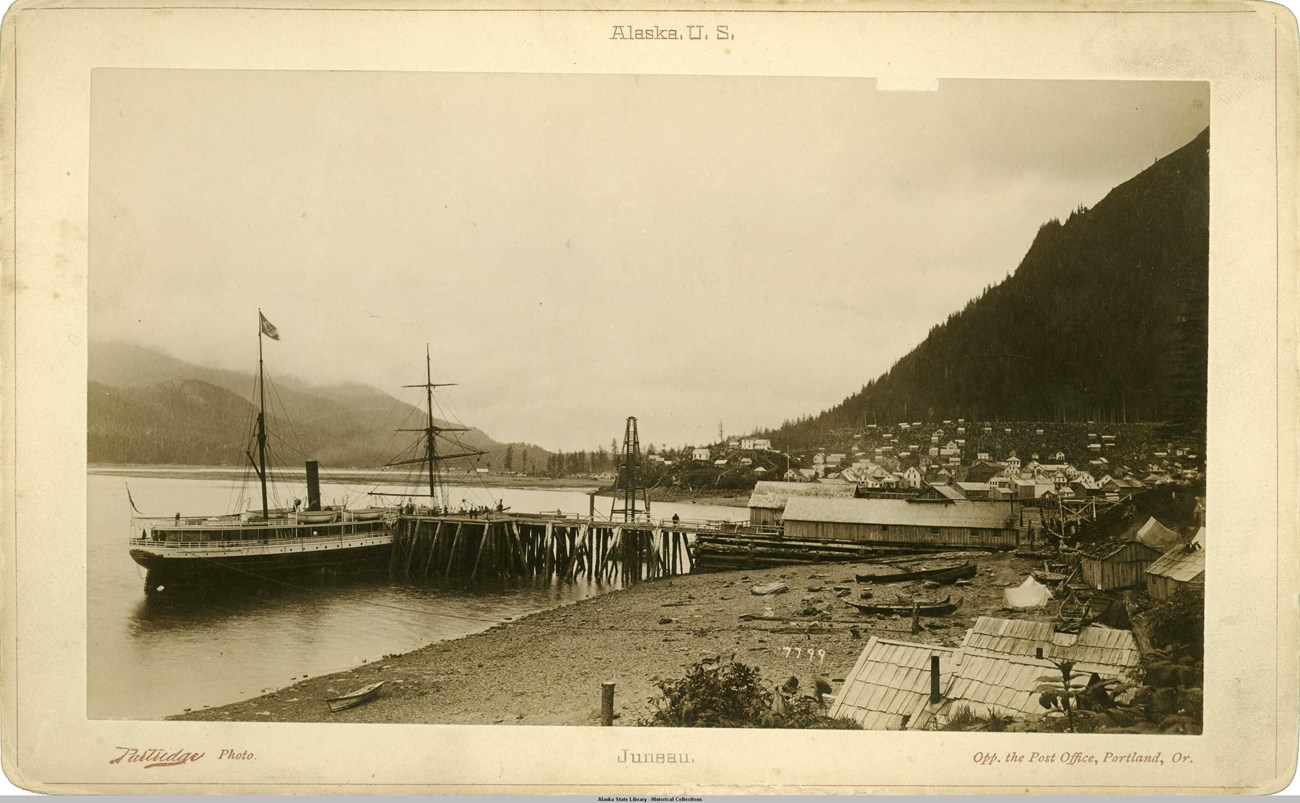 Sepia historical image showing steamer idaho at port