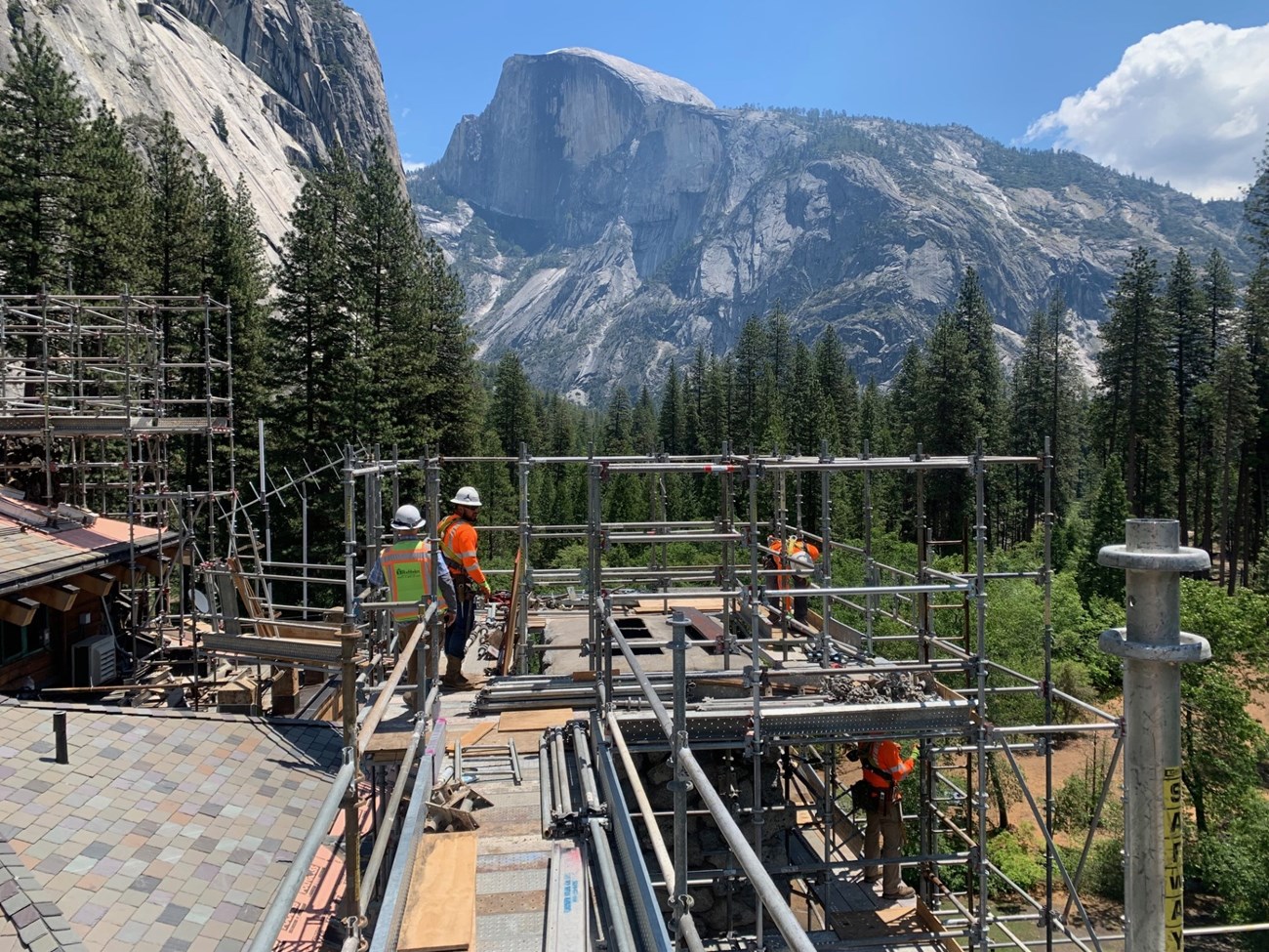 Reinforcing the chimney with Half Dome in the background Reinforcing the chimney with Half Dome in the background