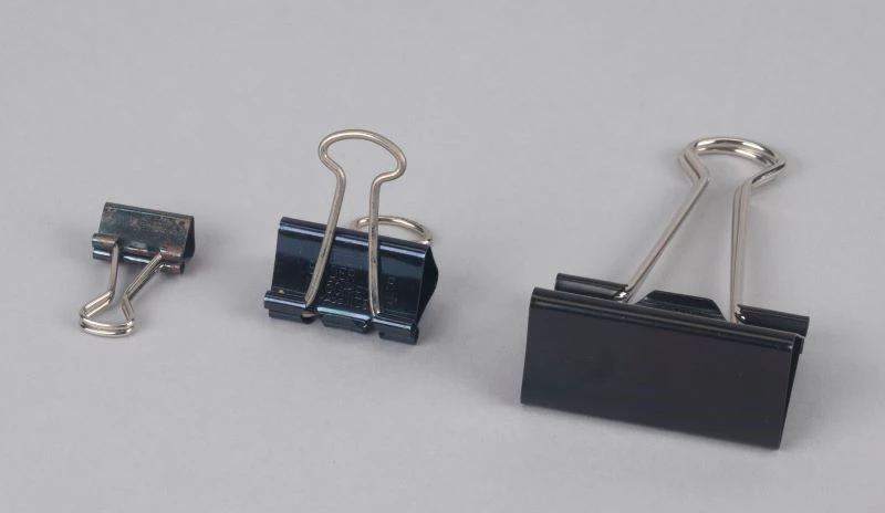 Different sizes of binder clips. Binder clips