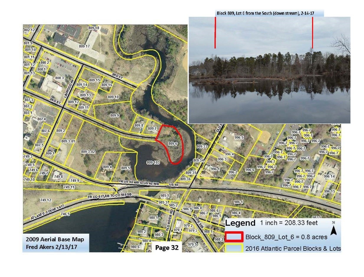 Above shows a map and image of lot 809 which was acquired as a public green space location. Above shows a map and image of lot 809 which was acquired as a public green space location.