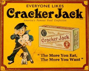 Advertisement for Cracker Jack with little boy dressed like a sailor and a small dog in front of him.