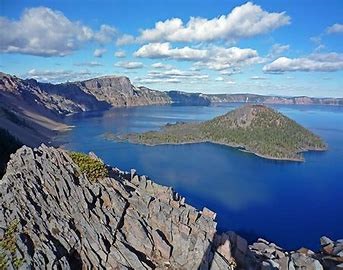 photo of a cinder cone that forms an island in crater lake