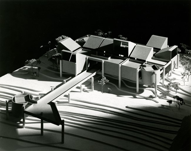 cropped west beach bath house model for web Architectural model of West Beach Bath House; modular structure surrounded by trees.