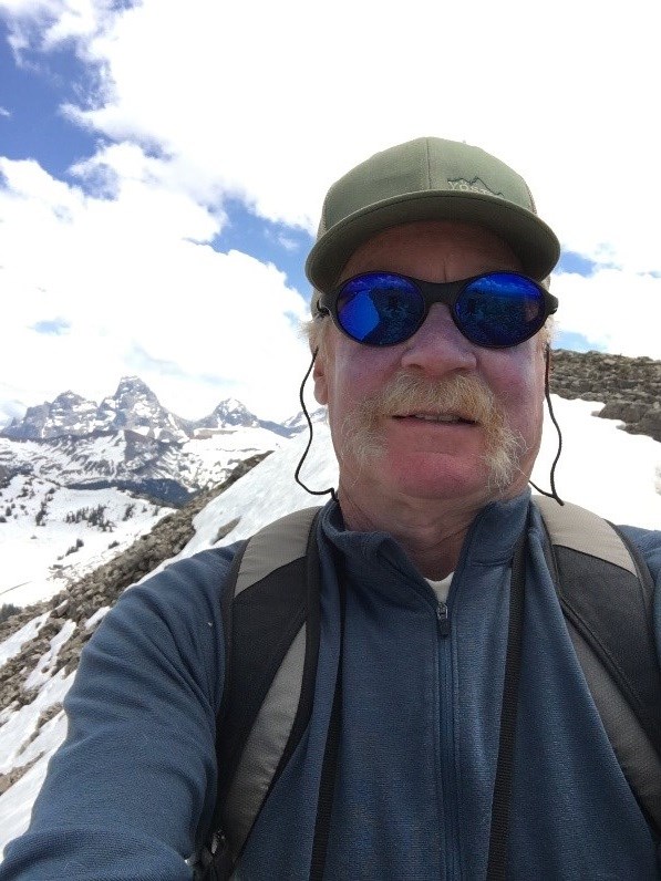 A selfie of Dan Bowler at the top of the Targhee Ski Resort with a view of Grand Teton in the background. A selfie of Dan Bowler at the top of the Targhee Ski Resort with a view of Grand Teton in the background.