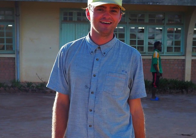 lt= A man in a blue shirt.
