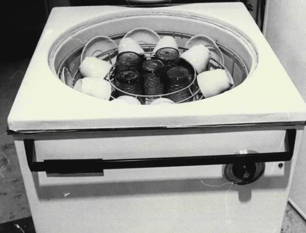 dishwashser Black and white of dishwasher that is large like a washing machine for clothes.