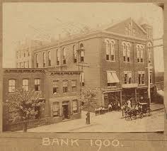 A three story hall next to two different two story buildings on 2nd street in Richmond