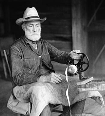 Resident of Shenandoah Man peeling apples