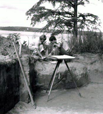 Jamestown Excavations Two people huddle over a site