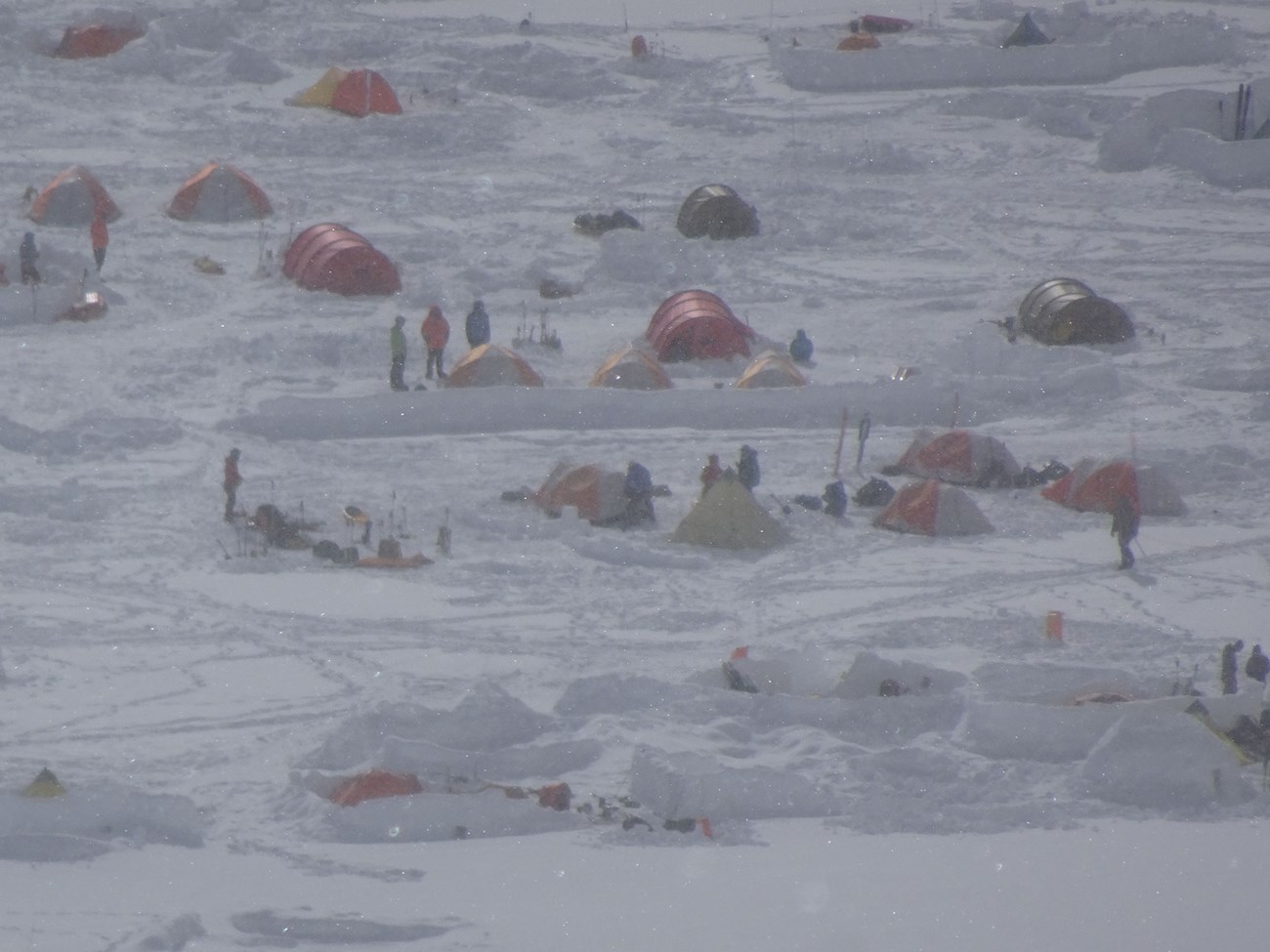 fig 1_cover_Loso_web A mountaineering camp on a glacier in a snowstorm.