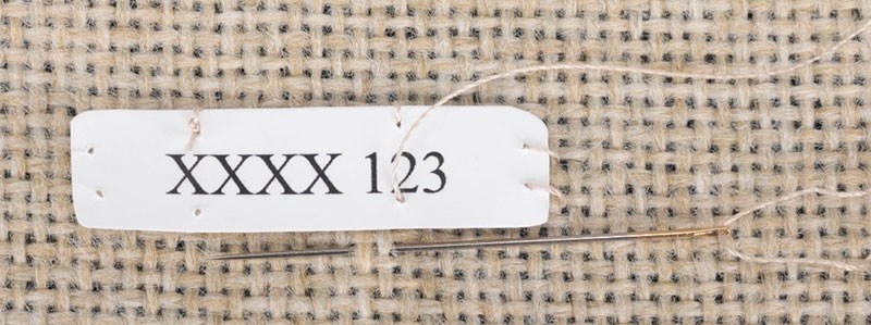 Figure 7. Partially stitched label.