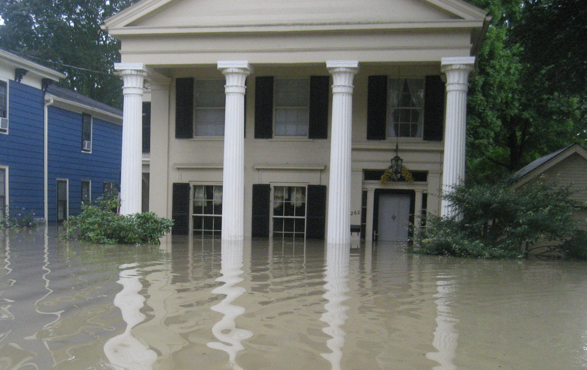 Greek Revival house in a flood.