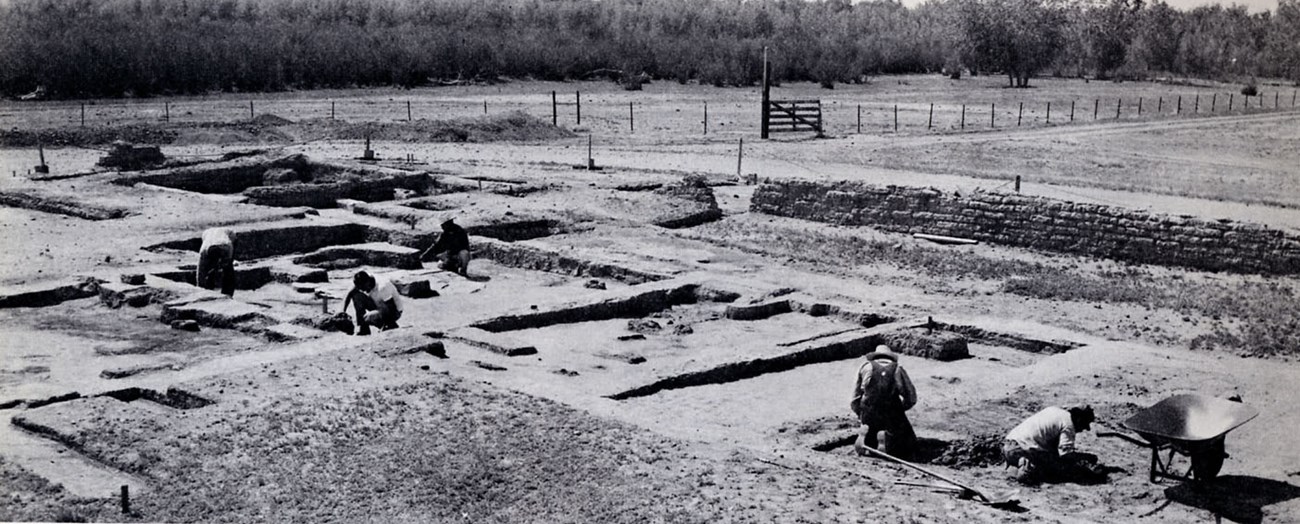A tight grid of trenches trace the walls of the fort during a large-scale archeological dig.