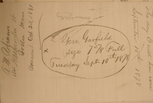 handwritten note that says Garfield's hat size 7 and 5/8