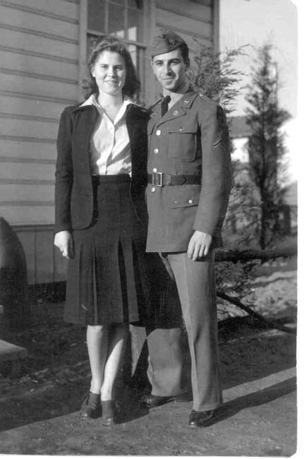 a young soldier and woman stand side by side