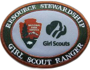 Girl Scout Ranger patch Oval patch with green outer band reading "Resource Stewardship" and "Girl Scout Ranger" in white. Center of patch is white with NPS arrowhead and Girl Scouts logos.