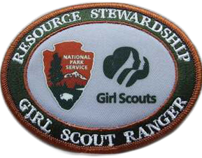 Girl Scout Ranger patch Oval patch with green outer band reading "Resource Stewardship" and "Girl Scout Ranger" in white. Center of patch is white with NPS arrowhead and Girl Scouts logos.