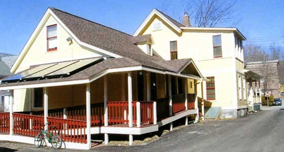 gothic-vt-solar-2 solar panels on roof of a rear porch