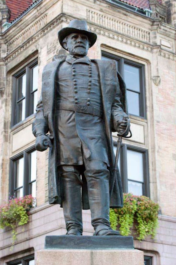 grant-statue-2014 Campbell House Museum Stone sculpted monument of Ulysses S. Grant in a Civil War General's uniform.