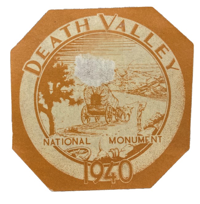 Orange-brown octagonal 1940 Death Valley windshield sticker