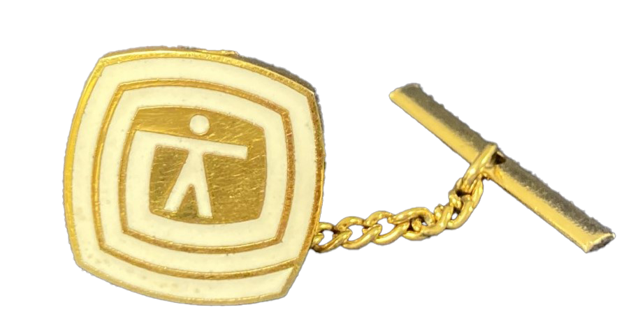 Gold tie tack with white Environman symbol