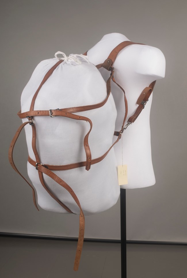 Pack harness Leather pack harness modeled on a mannequin torso