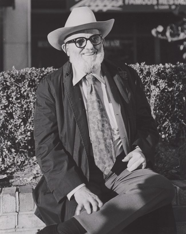 Ansel Adams Portrait of Ansel Adams as an old man in a suit with hat and beard