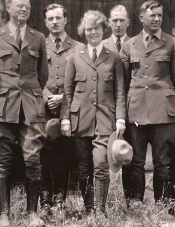 hfca_1607_boos_margaret_fuller_1929_u Five uniformed rangers stand facing the camera. The one woman of the group stands in the middle holding her hat.