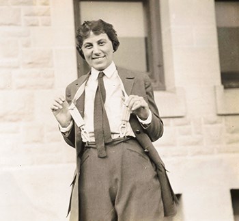 Freida B. Nelson wearing the NPS standard uniform shows off the suspenders holding up her trousers.