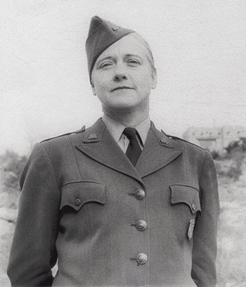 hfca_1607_shannon_viola_1951_u Viola Shannon at Carlsbad Caverns National Park, wearing a WAC-style coat with epaulettes her hair is tightly pulled back away from her face.