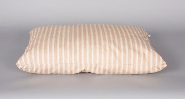 Mather's pillow Orange-tan and white striped pillow