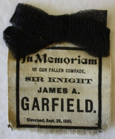black ribbon with tie on top In Memoriam...James A. Garfield
