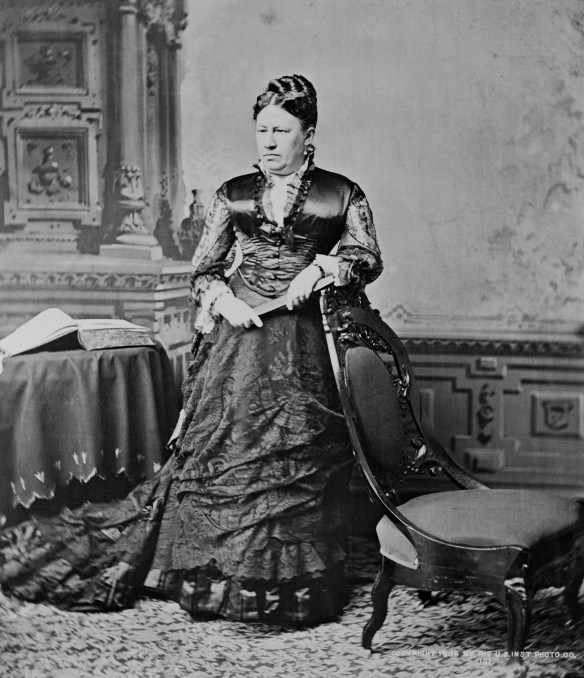 juliadentgrant a woman wearing a dark colored dress