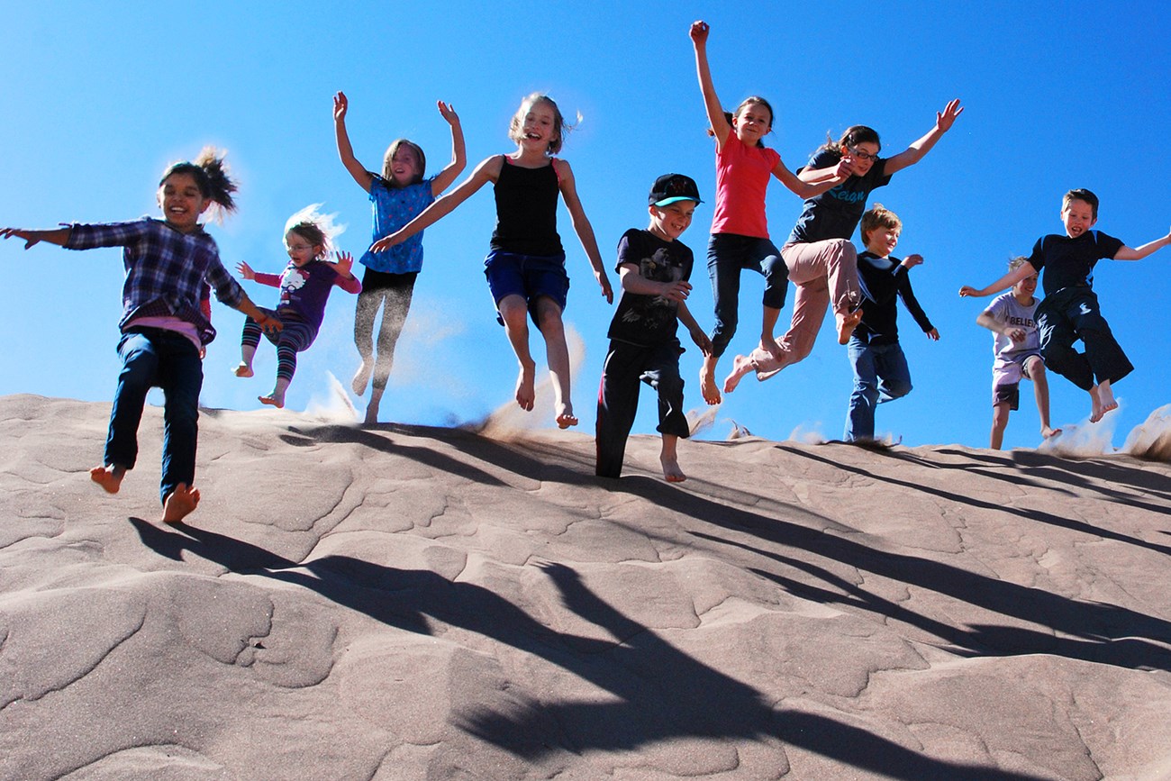 several kids jumping