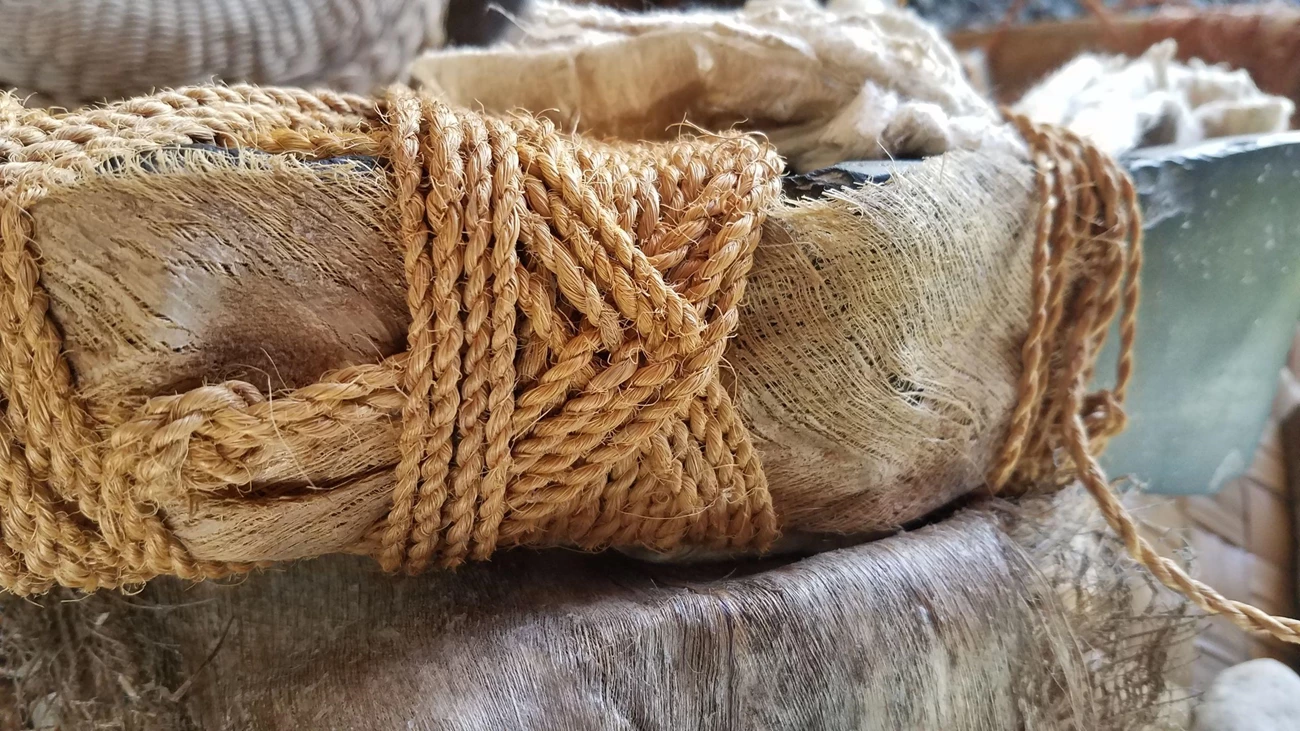 Koʻi (Stone adze) Close up image of a koʻi (stone adze) bound with coconut sennit