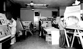 historic photo of people working at fulton lab