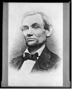 a faded photo of Abraham Lincoln