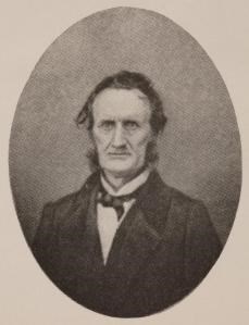milligan_witt_9399-001_preview older man has bushy sideburns, he is wearing a suit