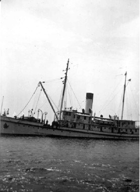 a large, historic ship on the water